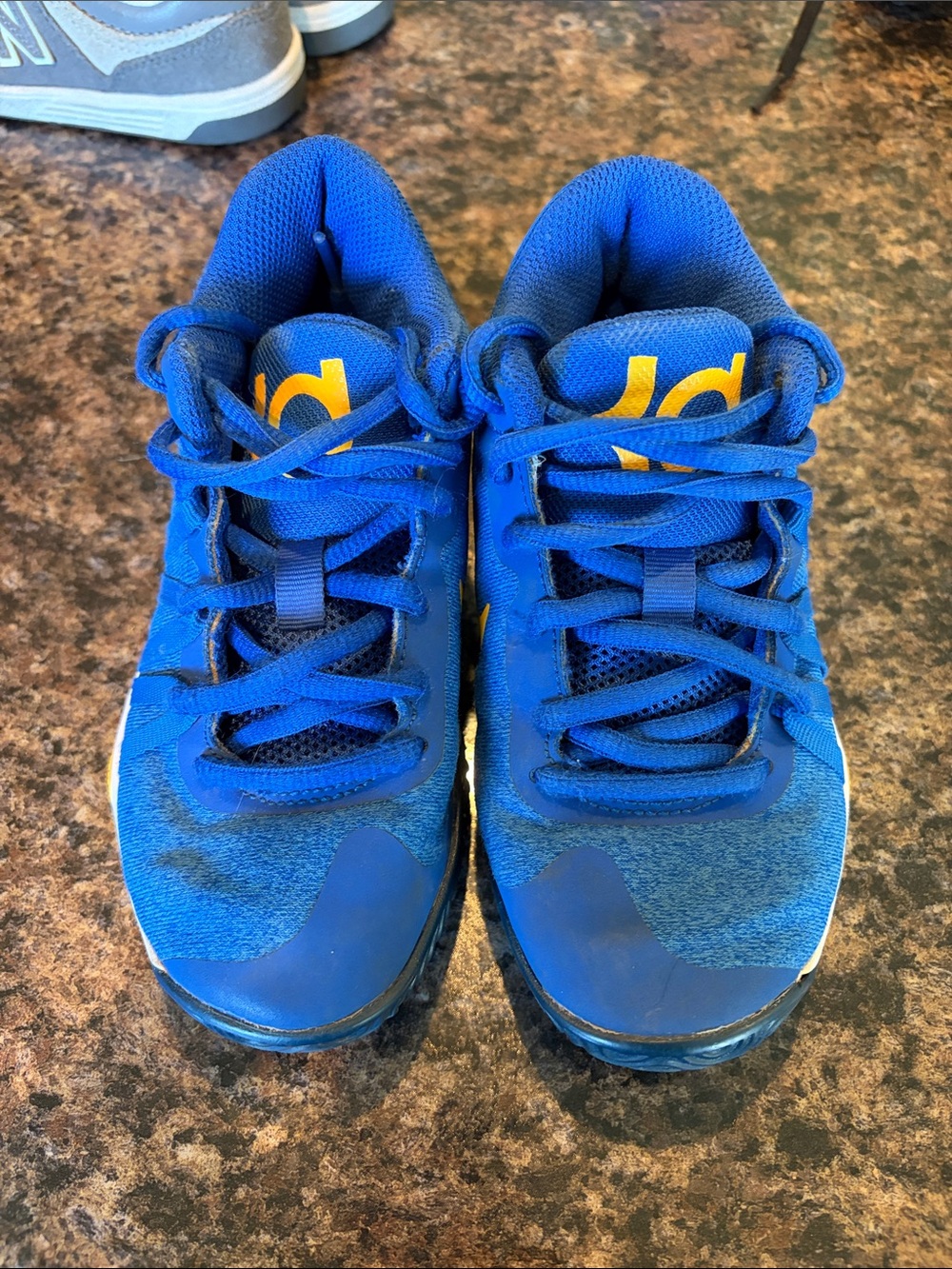 Nike Kids Blue Sneakers with Yellow Logo Accent